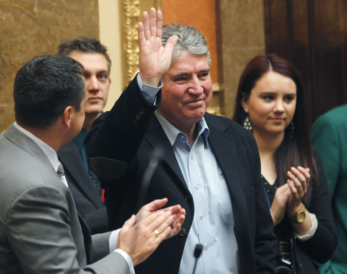 Al Hartmann  |  The Salt Lake Tribune
Former House Speaker Dave Clark acknowledges applause in the chamber Tuesday February 13.  He lives in Santa Clara near St. George.   He was on hand for passage of HB61 to change Dixie State College to university status.